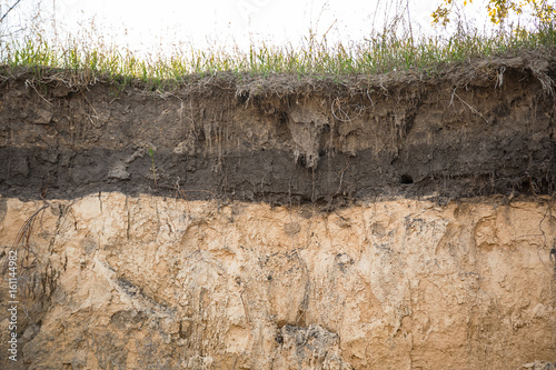 Fotografie The layers of the earth in a clay pit