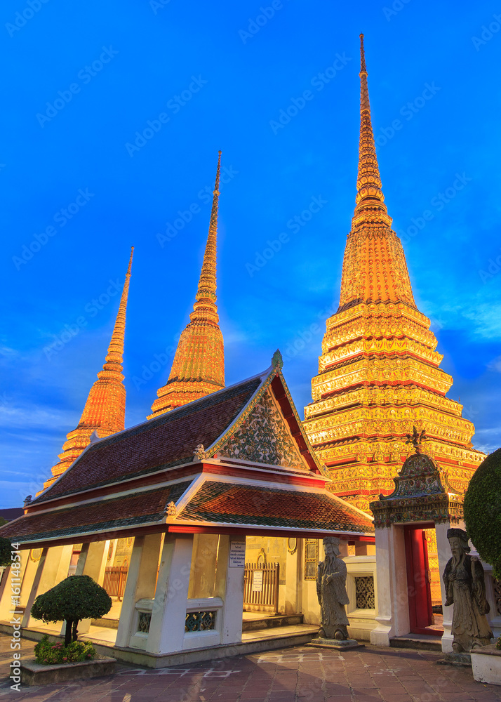 Fototapeta premium Wat Pho, Bangkok, Thailand. Also known as Wat Phra Chetuphon, 'Wat' means temple in Thai. The temple is one of Bangkok's most famous tourist sites. The temple has it's origins dating back to 1788.