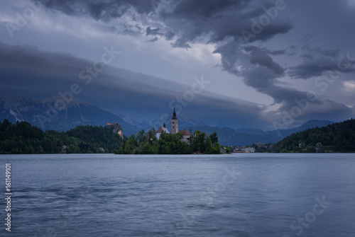 Amazing spring sunrise on Bled lake, Island, Church And Castle with Mountain Range (Stol, Vrtaca, Begunjscica) In The Background - Bled, Slovenia, Europe © djevelekova