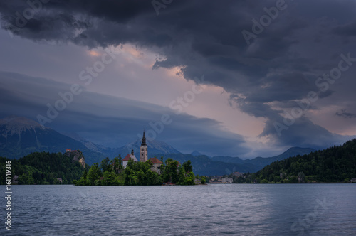 Amazing spring sunrise on Bled lake  Island  Church And Castle with Mountain Range  Stol  Vrtaca  Begunjscica  In The Background - Bled  Slovenia  Europe