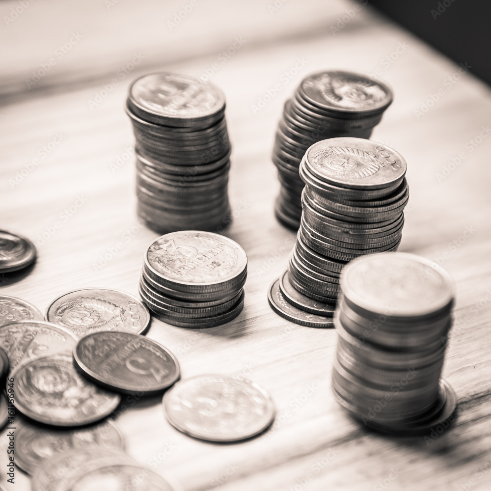 Old soviet coins on a wooden background - monochrome vintage look Old soviet coins on a wooden background - monochrome vintage look