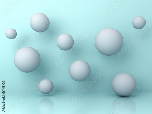 Fototapeta Naklejka Na Ścianę i Meble -  Abstract white flying 3d spheres on cyan background with reflection and shadows. 3D rendering.