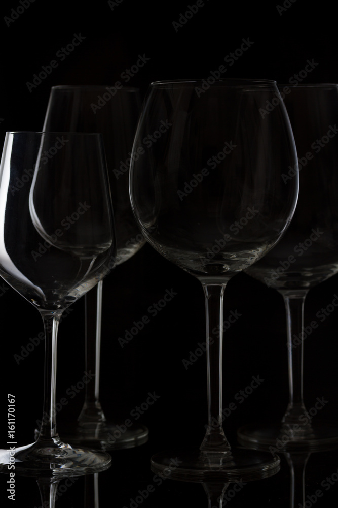 Set of wine glasses on black