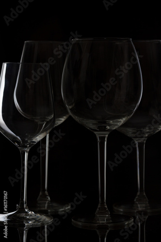 Set of wine glasses on black