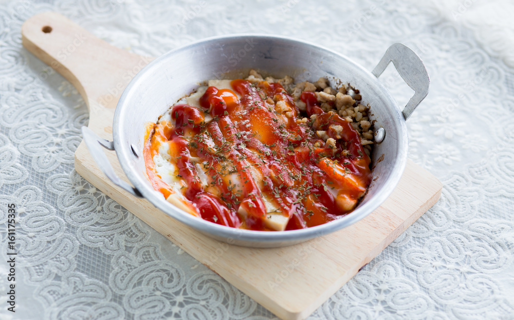 Egg pan with chili sauce Egg pan with chili sauce