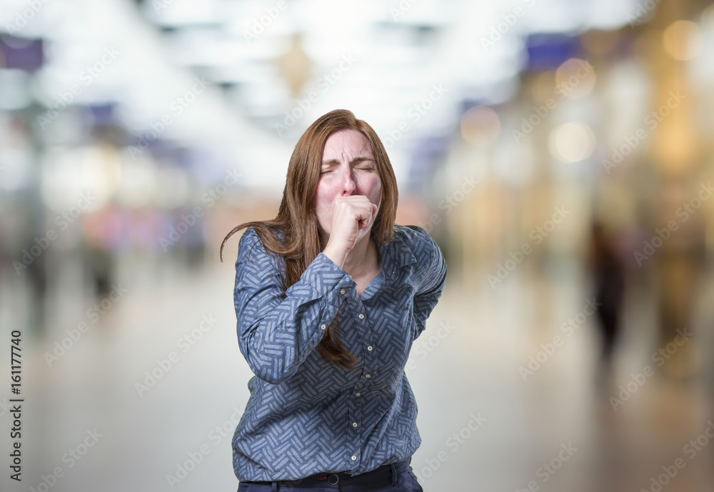 Pretty business woman making cough gesture Pretty business woman making cough gesture