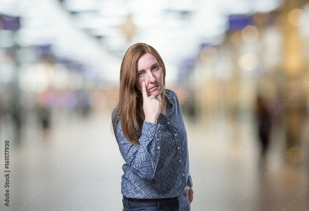 Fototapeta premium Pretty business woman looking something over blur background