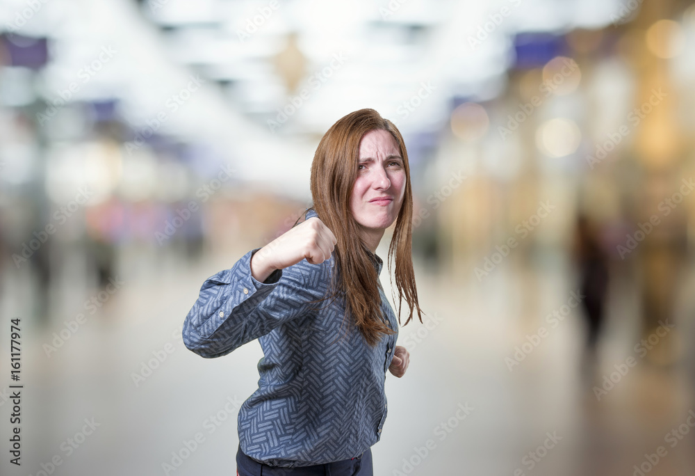 Pretty business woman frustrated over blur background