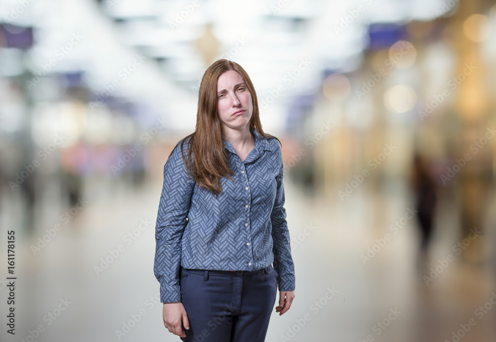 Pretty business woman worried over blur background