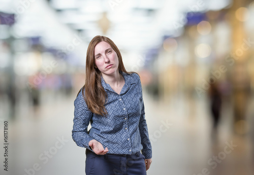 Pretty business woman worried over blur background
