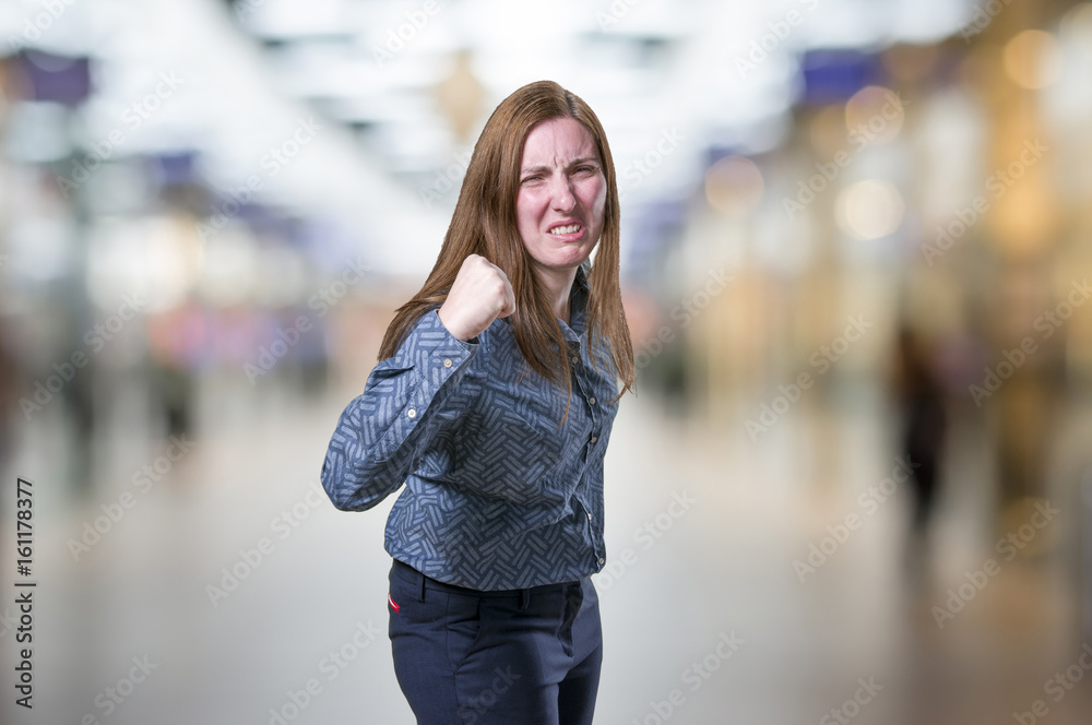 Fototapeta premium Pretty young businesswoman is angry