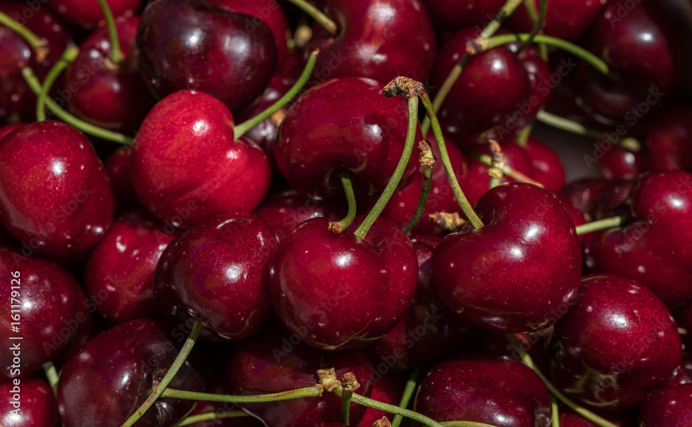 cherry detail macro of delicious fresh ripe red cherries with bright green stem, perfect food background Sweet cherry background cherry detail macro of delicious fresh ripe red cherries with bright green stem, perfect food background Sweet cherry background