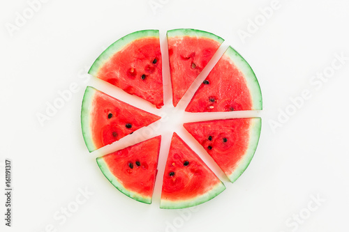 Tasty slices of watermelon on white background. Flat lay. Top view. Summer concept