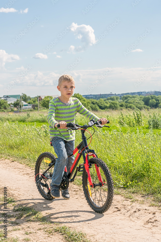 Fototapeta premium child on a bicycle