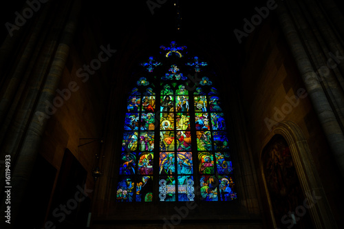 Beautiful stained glass window inside the St. Vitus Cathedral, Prague, Czech Republic