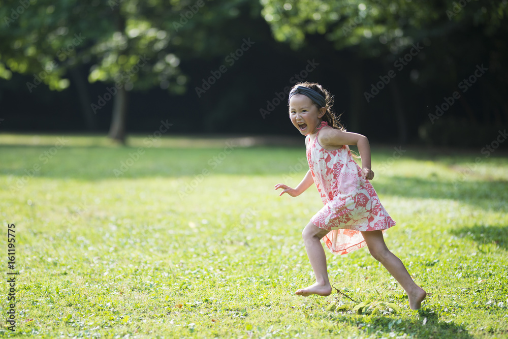 Happy Little Girl running in the meadow Happy Little Girl running in the meadow