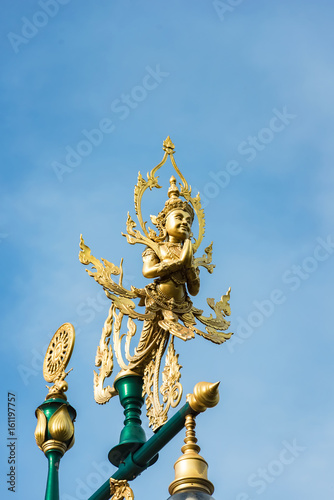 the Thai art angle brass on the top of pole light