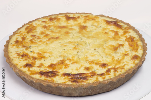 Wholemeal quiche cheese pie in white background
