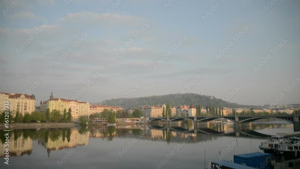 Swans, Charles bridge, Prague Praha , Czech Republic. White Swans birds at Charles bridge, Prague sunset, Vltava river. Prague Charles bridge old town panorama sunset sky, swan, duck, czech republic Swans, Charles bridge, Prague Praha , Czech Republic. White Swans birds at Charles bridge, Prague sunset, Vltava river. Prague Charles bridge old town panorama sunset sky, swan, duck, czech republic