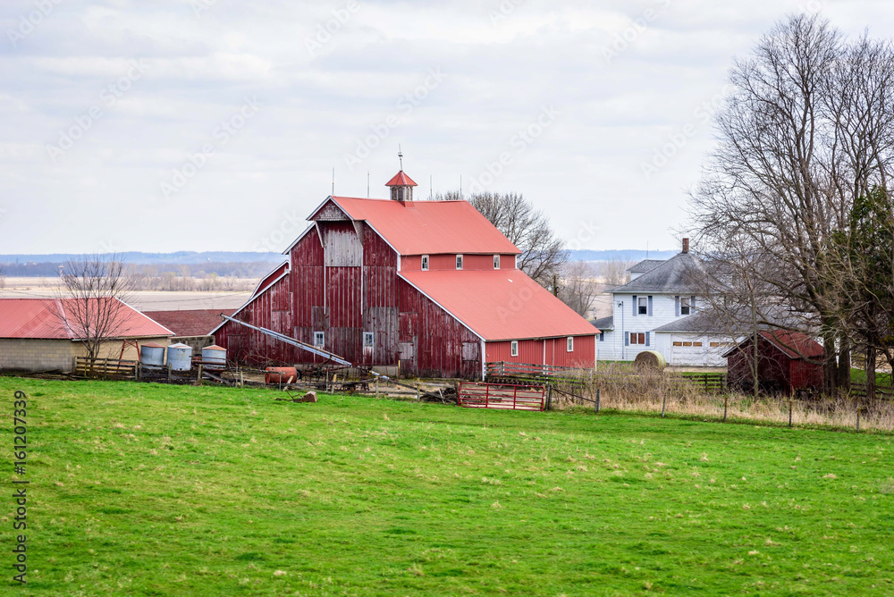 Red barn in rural midwestern countryside Red barn in rural midwestern countryside