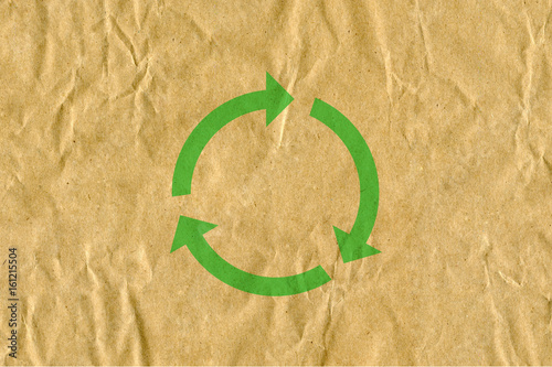 symbol for refuse reuse recycle with cardboard background photo