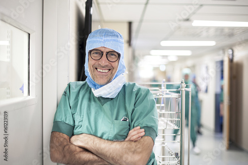 Portrait of surgeon in hospital corridor photo