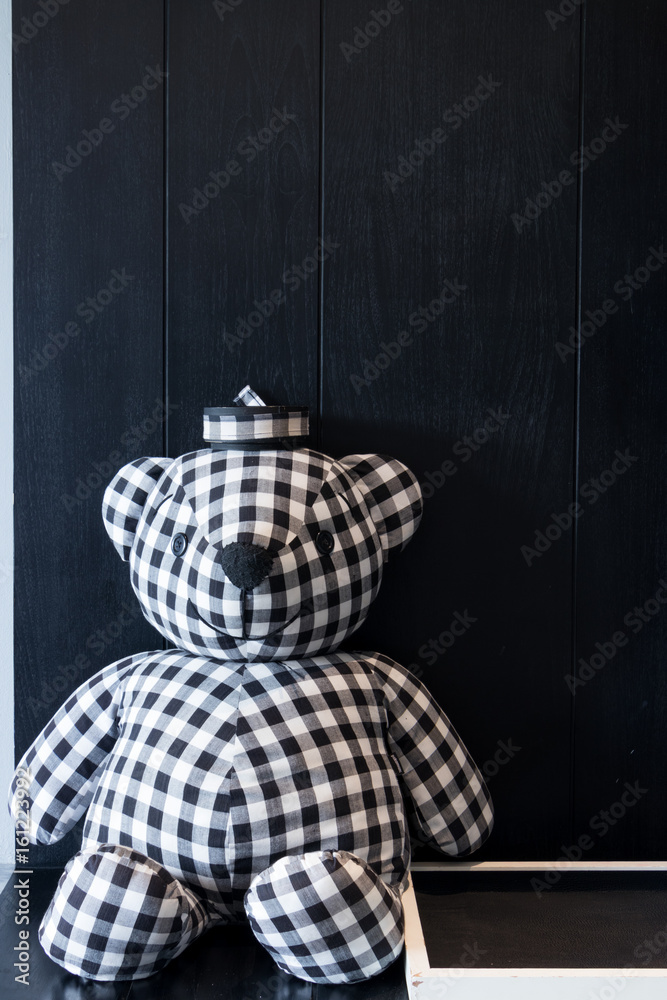 Teddy bear black white color on black background. Stock Photo | Adobe Stock