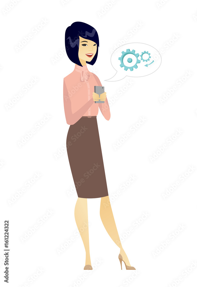 Asian business woman holding a mobile phone.