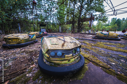 Fun fair in abandoned Pripyat city of Chernobyl Exclusion Zone, Ukraine photo