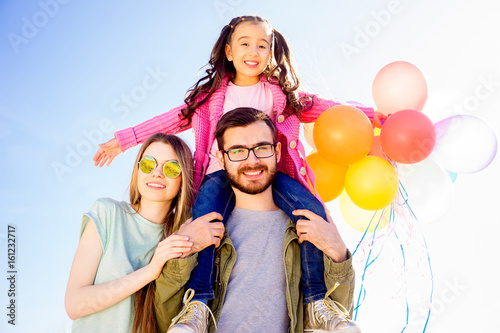 Family with balloons