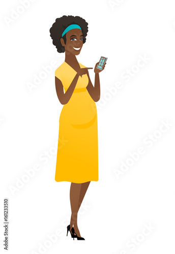African pregnant woman holding a mobile phone.
