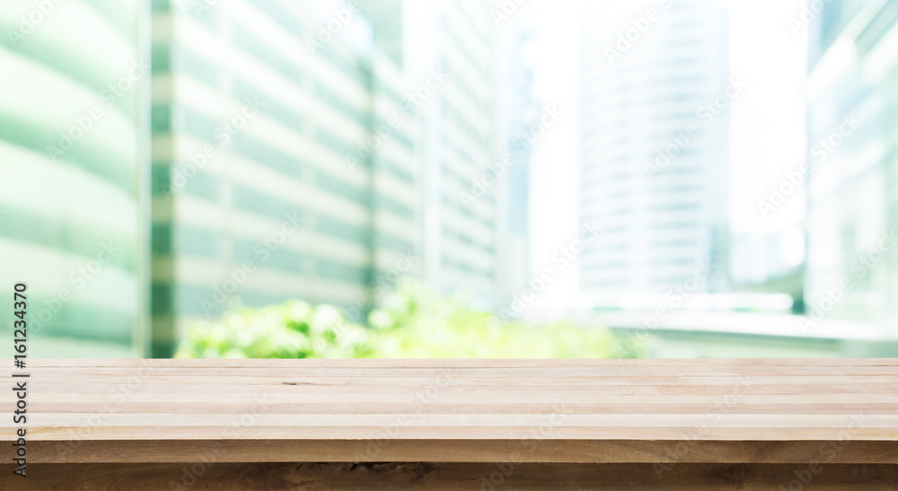 Wood table top with building office view background Wood table top with building office view background