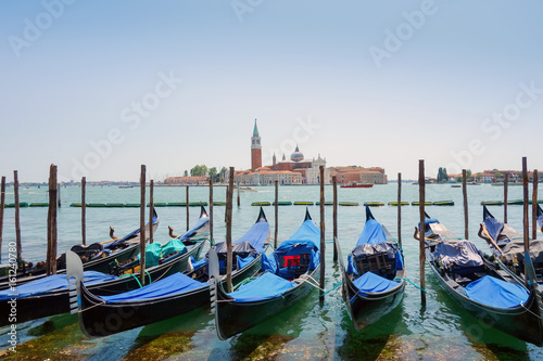 Tourists on water street with Gondola in Venice  ITALY