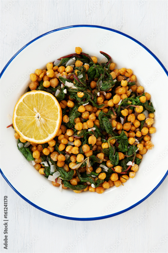 Warm salad with roasted swiss chard leaves and baked chickpeas 
