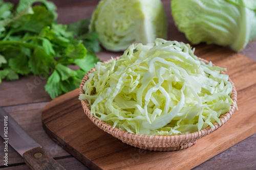 Fresh shredded cabbage in wicker basket