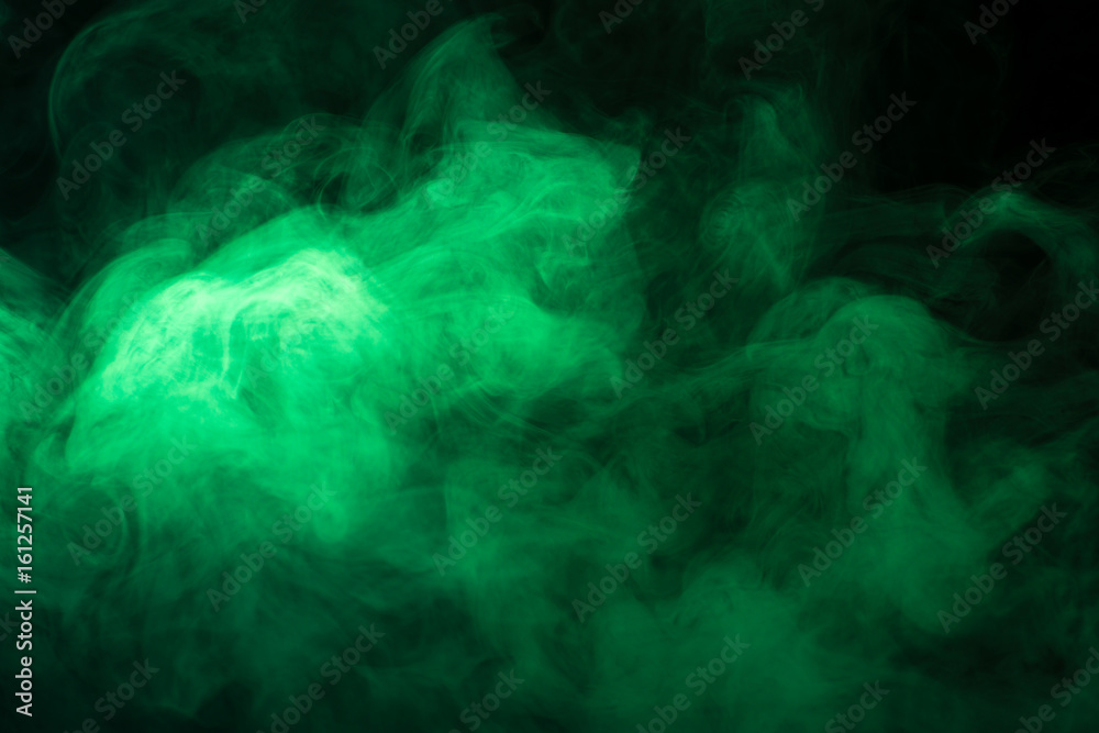 Green smoke texture on a black background Green smoke texture on a black background