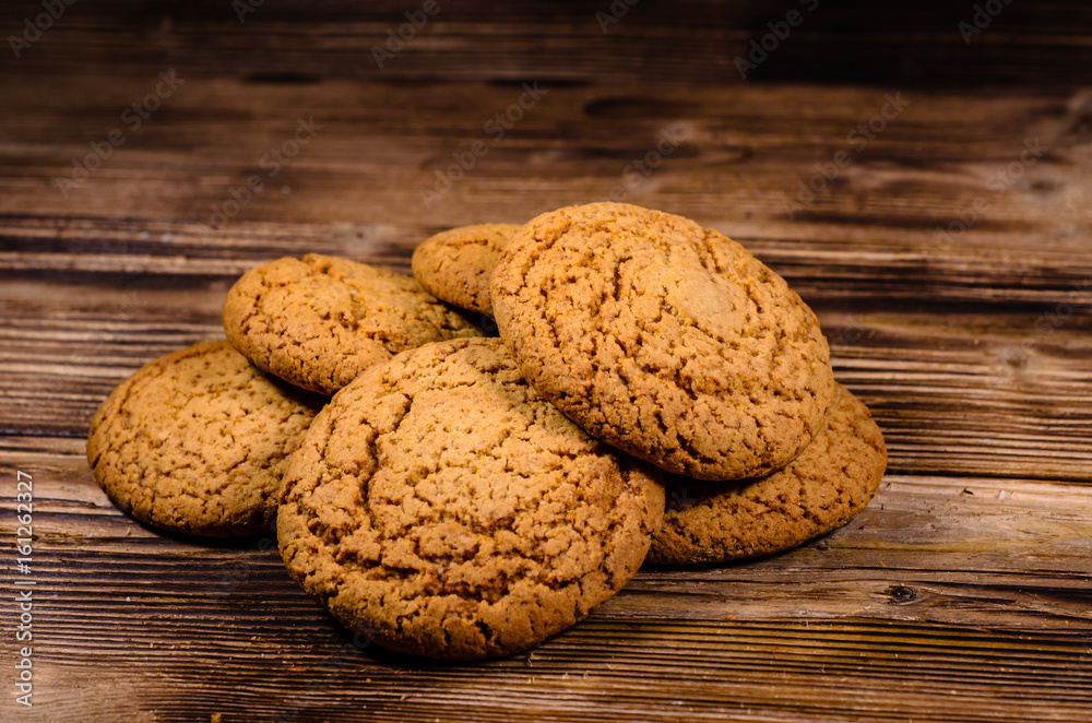 Stack of the oatmeal cookies on wooden table Stack of the oatmeal cookies on wooden table