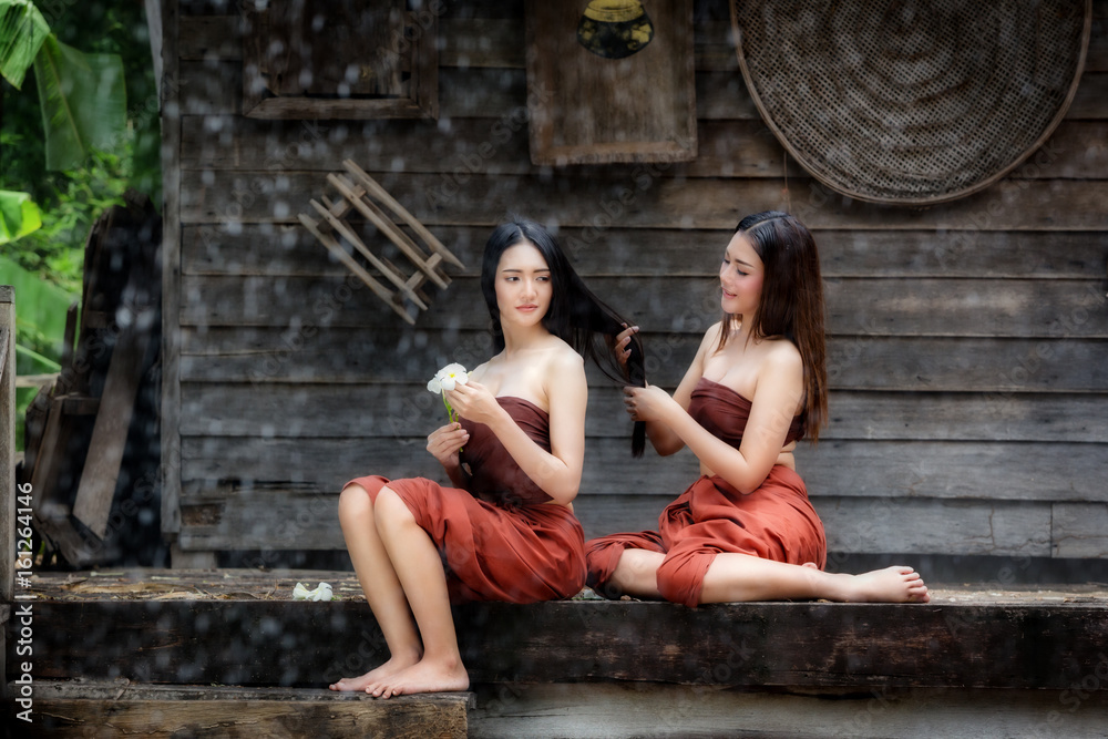 THAILAND Beautiful two women is a friend together in Thai traditional dress