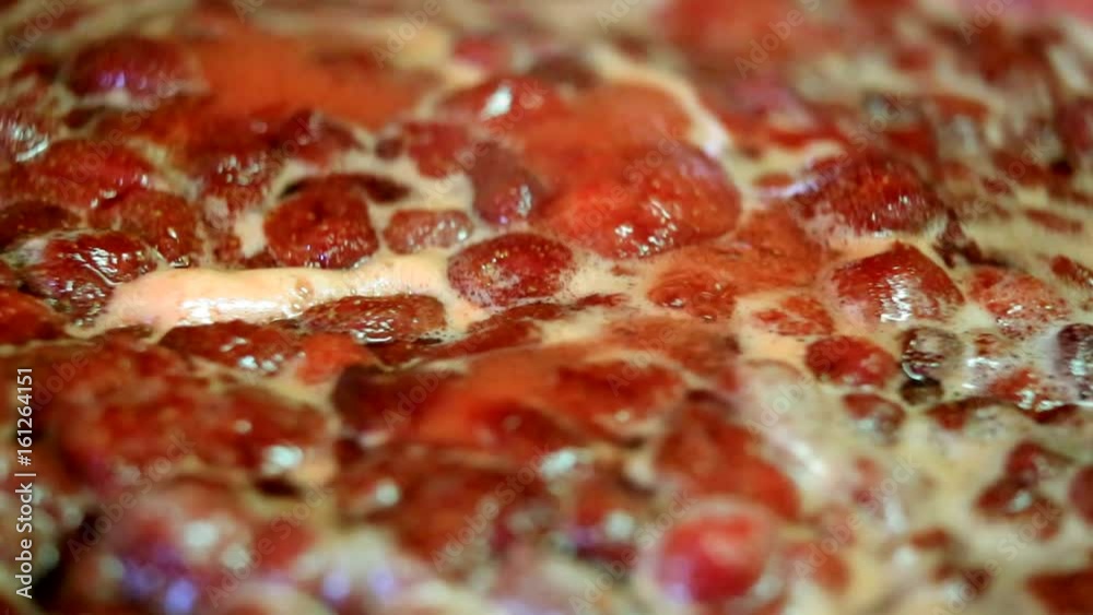 Cooking delicious strawberry jam closeup Cooking delicious strawberry jam closeup