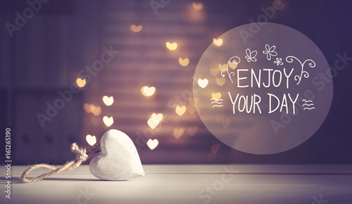 Enjoy Your Day message with a white heart with heart shaped lights