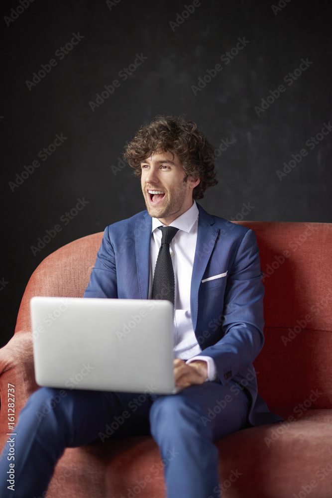 Exexutive young professional man with laptop Exexutive young professional man with laptop