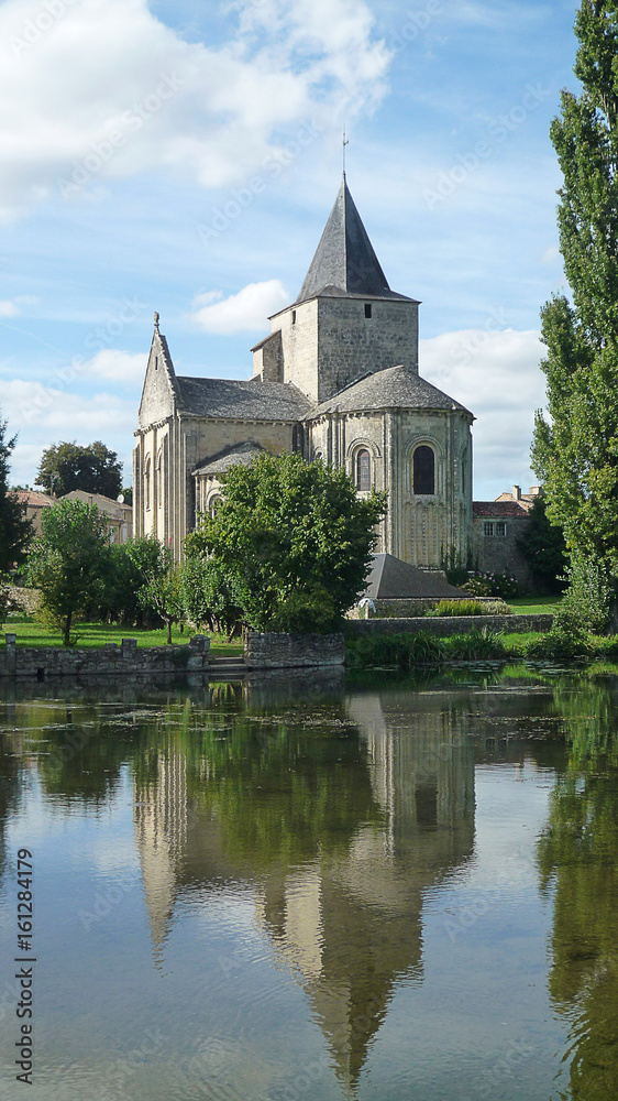 church with reflection in river