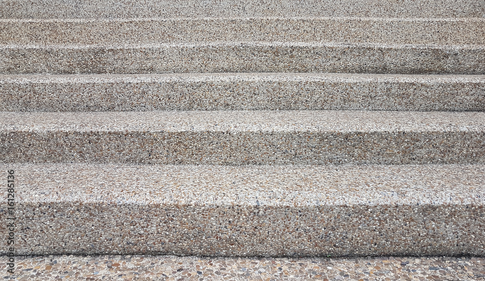Upper sandstone stair with colorful marble scattered Upper sandstone stair with colorful marble scattered