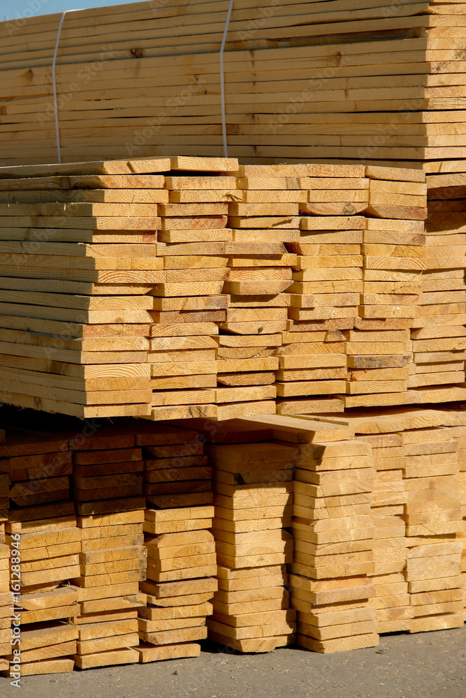 Wooden planks on timber yard, warehouse or sawmill. Wooden planks on timber yard, warehouse or sawmill.
