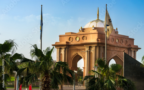 ABU DHABI,UNITED EMIRATES-20 MARCH 2017: Gate to the Emirates Palace hotel on March 20, 2017, UAE. Seven stars Emirates Palace is the second most expensive hotel ever built for about 6 billion USD photo