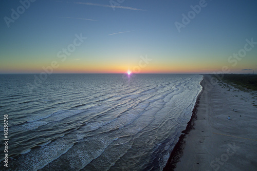 Konstfotografi Summer solstice sunset in Baltic sea at latvian coast.