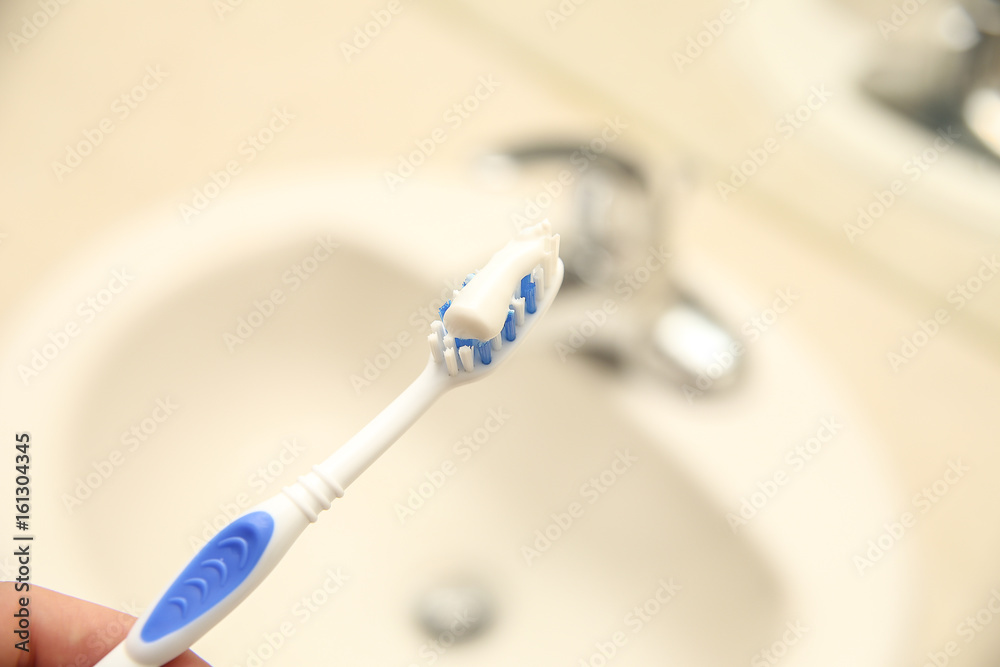 toothbrush in bathwoom toothbrush in bathwoom