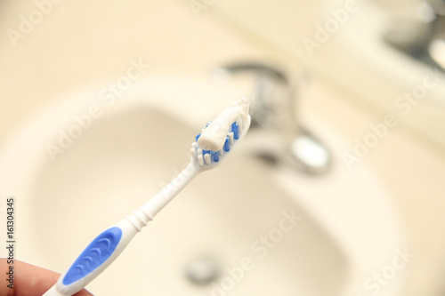 toothbrush in bathwoom