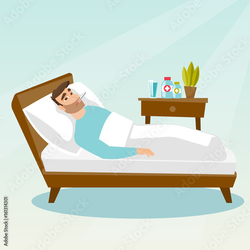 Sick man with thermometer laying in bed.
