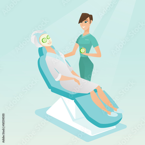 Cosmetologist making beauty treatments to a woman.
